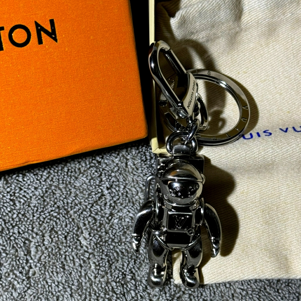 Louis vuitton space man key charm
